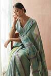 Shop_Dressfolk_Blue Linen V-neck Handloom Saree With Blouse _at_Aza_Fashions