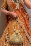 Buy_House Of Kosha_Gold Cut Work, Sequins, Crystals Sunheri Suede Embellished Potli _at_Aza_Fashions