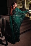 Midushi Bajoria_Green Georgette Sequins, Rhinestones Round Neck Fiza Applique Saree With Trail _Online