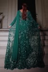Midushi Bajoria_Green Georgette Sequins, Rhinestones Round Neck Fiza Applique Saree With Trail _Online_at_Aza_Fashions