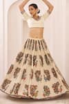 Buy_Aamra By Lavanya_Ivory , Chanderi Embroidery, Pom-poms, Tassels Maroon Hand Lehenga Set _at_Aza_Fashions