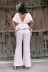 Shop_Lasha_Ivory Silk, Net Pearls, Sequins, Beads Round Neck Peplum Top And Trouser Set _at_Aza_Fashions