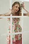 Surabhi Arya_Ivory Muslin Off-shoulder, Bandeau Neck Floral Peplum Top And Skirt Set _at_Aza_Fashions
