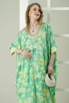 Surabhi Arya_Green Muslin Embroidery V-neck Floral Hand Kaftan Set _at_Aza_Fashions