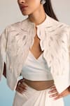House Of Armuse_Ivory Neoprene Pearls, Embroidery V-neck Threadworm Cape And Skirt Set _Online_at_Aza_Fashions