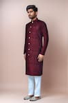 Samyukta Singhania_Maroon Velvet, Silk Embroidery Thread Kurta Set _at_Aza_Fashions