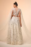 Shop_Couture By Niharika_Ivory Net, Organza Sequins, Embroidery Round Neck Designer Lehenga Set _at_Aza_Fashions