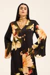 Ruhr India_Black Satin V-neck Floral Print Jumpsuit _at_Aza_Fashions