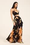 Buy_Ruhr India_Black Satin Asymmetric Floral Crop Top And Dhoti Skirt Set _Online_at_Aza_Fashions