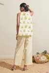 Shop_Dressfolk_Ivory Cotton Halter Neck Floral Print Top And Striped Pant Set _at_Aza_Fashions