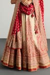 RI.Ritu Kumar_Off White Silk, Chinon Zari, Embroidery, Tassels Round Designer Red Lehenga Set _Online_at_Aza_Fashions
