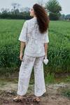 Shop_She'll_Ivory Jacquard Tassels V-neck Self Shirt And Pant Set _at_Aza_Fashions