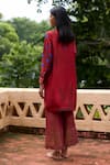 Shop_Medha_Orange Silk, Tissue Embroidery, Tassels Round Neck Dark Kurta And Pant Set _at_Aza_Fashions