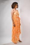 Rimi Nayak_Orange Viscose, Crepe Pearls One Shoulder Bougainvillea Printed Dress _Online_at_Aza_Fashions