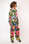 Rimi Nayak_Black Viscose, Crepe Watersplash Floral Printed Trouser _Online_at_Aza_Fashions