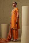 Shop_Kesar Studio_Orange Silk, Tissue Embroidery Round Neck Designer Salmon Kurta Set _at_Aza_Fashions