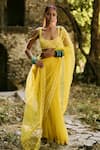 Surily G_Yellow Net Sequins, Cut Work Round Neck Back Tie-up Blouse _Online_at_Aza_Fashions