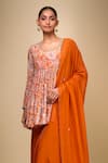 Samyukta Singhania_Orange Crepe Round Neck Floral Peplum Kurta And Gharara Set _at_Aza_Fashions