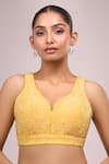 Samyukta Singhania_Yellow Silk Crystals V-neck Padded Blouse _Online_at_Aza_Fashions