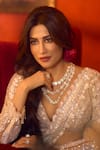 Buy_Seema Gujral_Beige Net Sequins, Crystals, Tassels Plunge Neck Embroidered Saree Set 