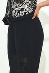 Buy_Qala Clothing_Black Knit Embroidery Round Neck Top And Bellbottom Pant Set _Online_at_Aza_Fashions
