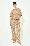 Buy_Qala Clothing_Beige Knit Embroidery Round Neck Floral Top And Pant Set _at_Aza_Fashions