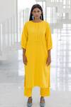 Silai Studio_Yellow Linen, Viscose Round Neck Sunflower Kurta Set _at_Aza_Fashions