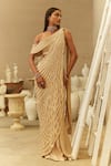 Shop_Mehul Gupta_Beige Crepe Pearls Asymmetric Gold Hand Embroidered Saree Set _at_Aza_Fashions