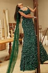 Mehul Gupta_Green Net Sequins Sweetheart Neck Hand Embroidered Lehenga Set _at_Aza_Fashions