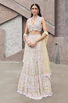 Buy_Mehul Gupta_Ivory Net, Lycra Embroidery V-neck Lehenga Set _at_Aza_Fashions
