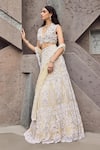 Shop_Mehul Gupta_Ivory Net, Lycra Embroidery V-neck Lehenga Set _Online_at_Aza_Fashions