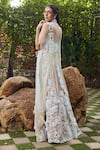 Shop_Mehul Gupta_Ivory Net, Lycra Embroidery Halter Neck And Beige Hand Lehenga Set _at_Aza_Fashions