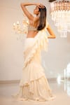 Shop_Foram Patel_Cream Georgette Embroidery, Mirrors, Cut Pre-draped Ruffle Saree With Blouse _at_Aza_Fashions