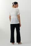 Shop_Vinusto_White Cotton Embroidery V-neck Chikankari Top And Black Pant _at_Aza_Fashions