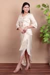 Nidhi Kejriwal_Off White Crepe, Modal, Satin Sequins, Embroidery V-neck Jacket And Draped Skirt _at_Aza_Fashions