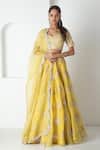 Buy_Chhaya Mehrotra_Yellow Silk Organza, Chanderi Tassels, Embroidery Illuminating Lehenga Set _at_Aza_Fashions