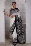 Buy_Anita Kanwal_Black Modal, Silk And White Designer Saree & Unstitched Blouse Piece Set _at_Aza_Fashions