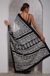 Shop_Anita Kanwal_Black Modal, Silk And White Designer Saree & Unstitched Blouse Piece Set _at_Aza_Fashions
