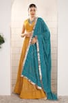 Buy_Anita Kanwal_Mustard Georgette Sequins V-neck Yellow And Peacock Blue Lehenga Set _at_Aza_Fashions