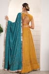 Anita Kanwal_Mustard Georgette Sequins V-neck Yellow And Peacock Blue Lehenga Set _Online_at_Aza_Fashions