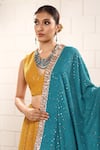 Shop_Anita Kanwal_Mustard Georgette Sequins V-neck Yellow And Peacock Blue Lehenga Set _Online_at_Aza_Fashions