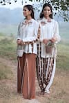 Shop_Kushani_Ivory Linen, Silk, Cotton Embroidery Round Neck Jacket And Mocha Brown Trouser Set _Online_at_Aza_Fashions