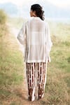 Shop_Kushani_Ivory Linen, Silk, Cotton Embroidery Collared Floral Shirt And Trouser Set _at_Aza_Fashions