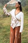Kushani_Ivory Satin, Linen Embroidery V-neck Wrap Top And Mocha Brown Trousers _Online_at_Aza_Fashions