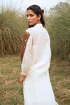 Shop_Kushani_Ivory Linen, Silk Beads, Tassels Button-down Neck Harmony Whispers Dress _at_Aza_Fashions