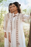 Kushani_Ivory Linen, Silk Beads, Tassels Open Neck Embroidered Dress _Online_at_Aza_Fashions