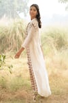 Buy_Kushani_Ivory Linen, Silk Beads, Tassels Open Neck Embroidered Dress _Online_at_Aza_Fashions
