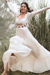 Kushani_Ivory Linen, Silk Beads, Tassels Round Neck Bohemian Tiered Dress _at_Aza_Fashions