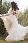 Shop_Kushani_Ivory Linen, Silk Beads, Tassels Round Neck Bohemian Tiered Dress _at_Aza_Fashions