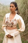 Kushani_Ivory Satin, Linen Tassels, Beads Round Neck Floral Serenity Lehenga Set _Online_at_Aza_Fashions